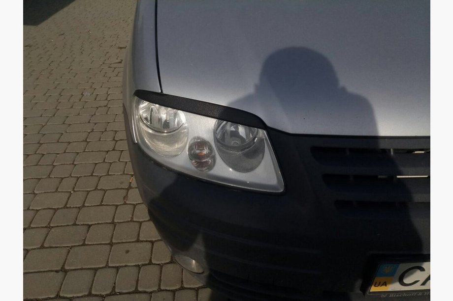 Volkswagen Caddy 2004-2010 Sprancene faruri (negre) Foto 8