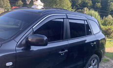 Hyundai Santa Fe 2 2006-2012 Deflectoare geamuri cu ornament cromat (4 buc, Niken) foto 1