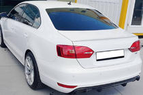Volkswagen Jetta 2011-2018 Spoiler OEM (grunduit pentru vopsire) foto 1