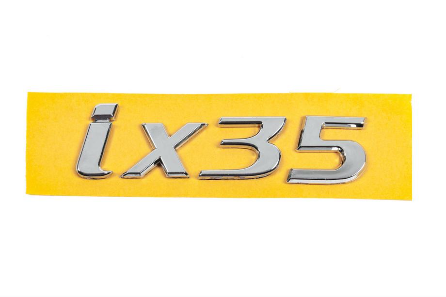 Hyundai IX-35 2010-2015 Emblema IX35 86310-2S010 (135mm x 37mm) Image