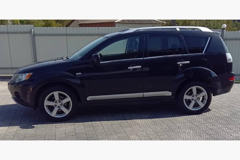 Mitsubishi Outlander 2006-2012 Ornamente geamuri inox (8 buc) Image