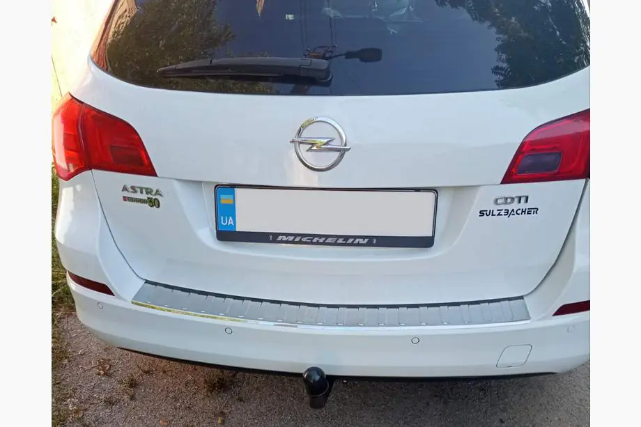 Opel Astra J 2009-2015 Protectie bara spate V-1 Carmos (SW, inox) Image