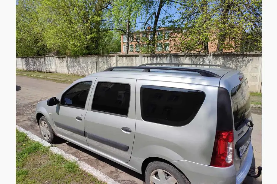 Lada Largus 2012- Bare longitudinale negre Image